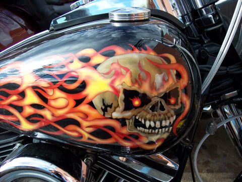 1972 Ford Ranchero - Custom airbrushed motorcycle gas tank features a skull with glowing red eyes engulfed in flames.