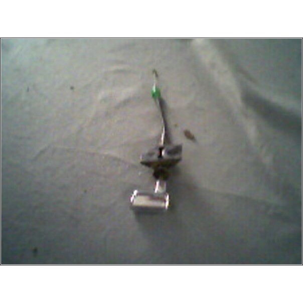 car part with wire and metal cylinder