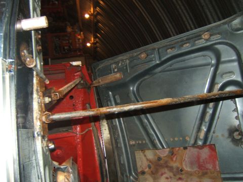 1980 Ford F-250 - Underside of the hood and inner fender of a 1980 Ford F-250 during restoration.