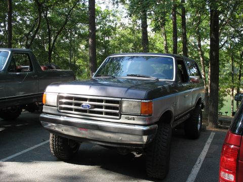 1995 Ford C-350 (Centurion Conversions) - This Ford Bronco appears to be from the late 1980s, not a 1995 model as claimed.