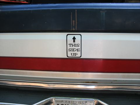 1995 Ford C-350 (Centurion Conversions) - Truck rear detail a "THIS SIDE UP" sticker and a Georgia license plate.