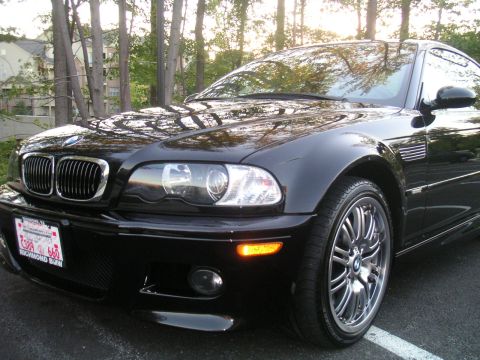 2002 BMW M3 - Front quarter view of a black 2002 BMW M3 coupe parked outdoors.