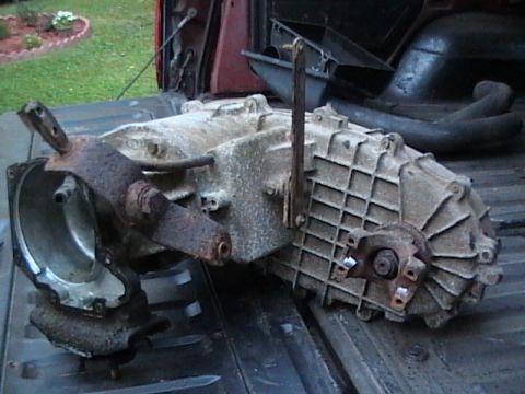 1990 Ford Bronco - A transfer case, likely from a 1990 Ford Bronco, is shown removed from the vehicle.