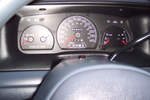 2001 Ford Crown Victoria - The dashboard of a 2001 Ford Crown Victoria shows the odometer reading 98,373 miles.
