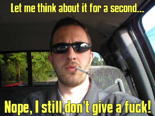 Man smoking cigarette in car interior