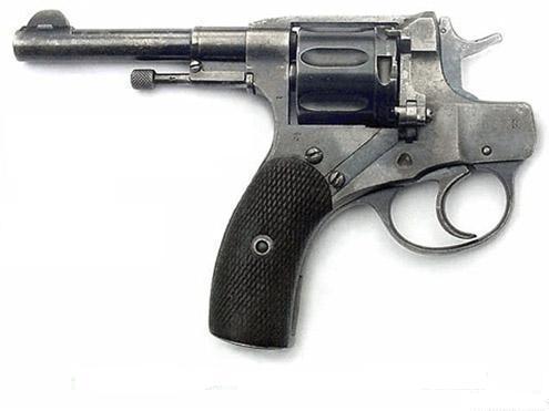 Revolver with black checkered grip, visible cylinder and trigger mechanism