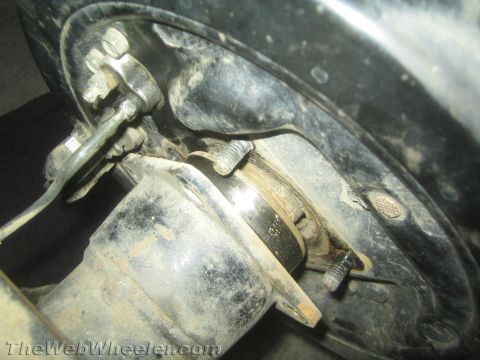 1987 Suzuki Samurai - Close-up view of a broken rear axle shaft, indicating a significant mechanical failure.