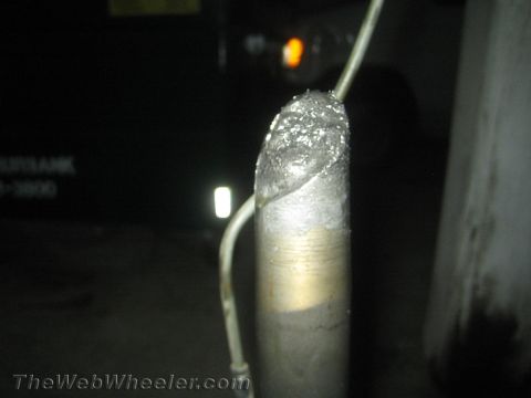 1987 Suzuki Samurai - The image shows a damaged metal axle, not a 1987 Suzuki Samurai.
