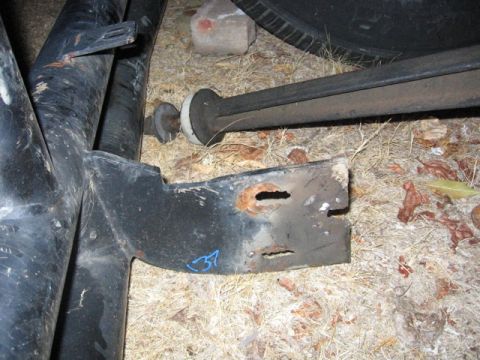 1989 Ford Bronco - Rusted metal bracket and suspension components are visible in this close-up view.