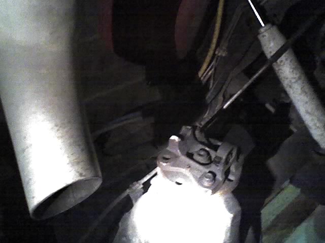 Exhaust pipe and suspension parts of a vehicle