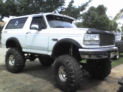 1995 Ford Bronco - This lifted 1995 Ford Bronco features large off-road tires and a modified suspension.