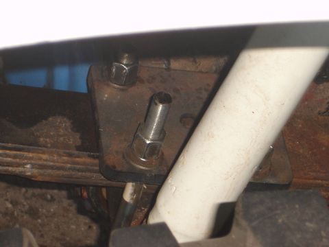 1989 Ford Bronco - This photo shows the mounting hardware for a leaf spring and shock absorber, not a specific vehicle model year.