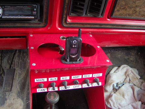 1978 Ford Bronco - Custom center console with auxiliary switches and a flip phone mounted in the interior.