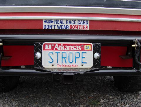 1978 Ford Bronco - Rear view of a red vehicle with a custom bumper and an Arkansas license plate.