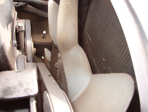 1993 Mitsubishi FTO - Those are spider webs on the fan - pretty strong, considering I just turned the engine off. But this shot is actually to show the radiator…