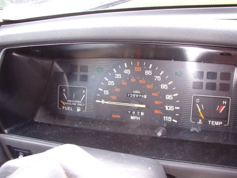 1993 Mitsubishi FTO - Interior view of a vehicle's dashboard, displaying the odometer and various gauges.