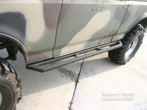 1991 Ford Bronco - This 1992 Ford Bronco features custom rock sliders and camouflage paint.