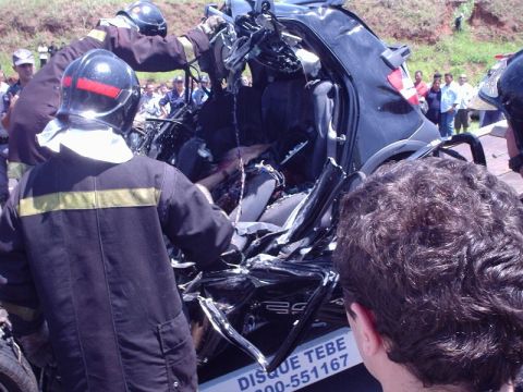 1987 Ford Thunderbird - Firefighters work at the scene of a severe car accident.