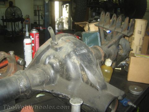 1968 Ford Mustang - Close-up of a differential housing with visible casting marks in a workshop setting.