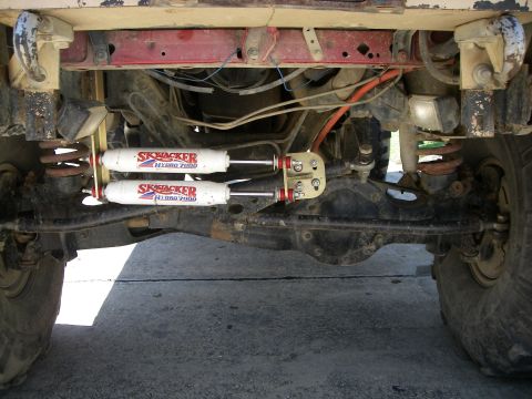 1995 Ford Bronco - This photo shows the front suspension and steering components of a vehicle, including dual shock absorbers.