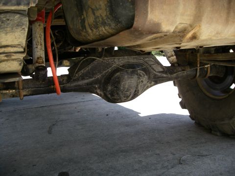 1995 Ford Bronco - This photo shows the rear axle assembly and suspension components of a vehicle.