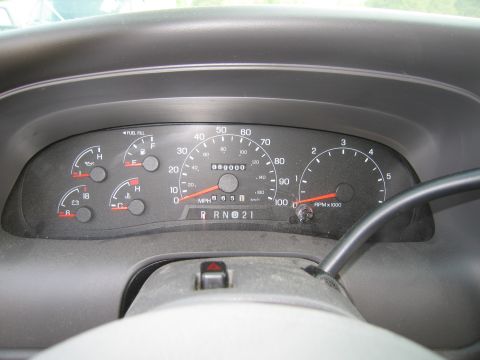 1991 Ford LTD Crown Victoria - Interior view of a vehicle's dashboard gauges, including fuel, oil, temperature, and tachometer.