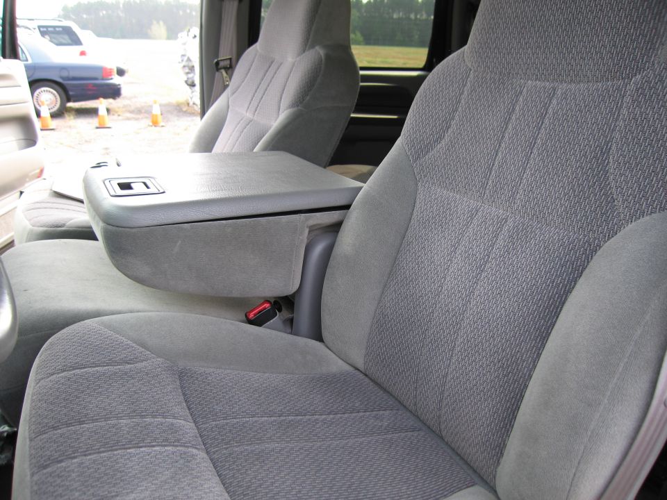 Gray fabric front seats with center console and armrest