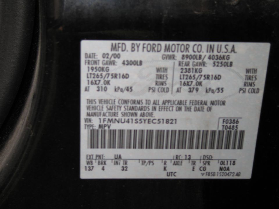 Ford Motor Co USA VIN certification plate with GVWR tire and paint codes
