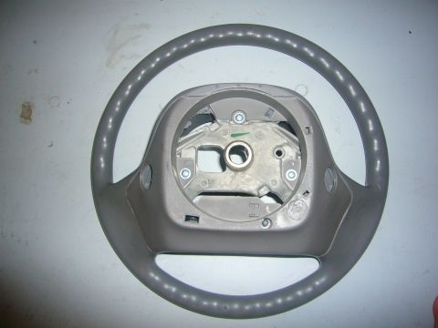 2000 Ford Crown Victoria - This is a close-up view of a vehicle's steering wheel, showing its internal components.