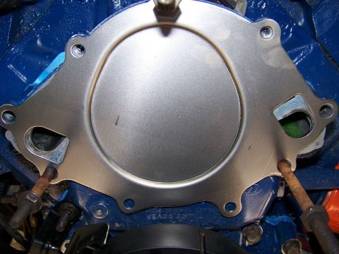 1990 Ford Bronco - Here's the backing plate that came with the pump - the wrong one for my Bronco. Good thing I noticed!!! The top of the driver's side inlet…