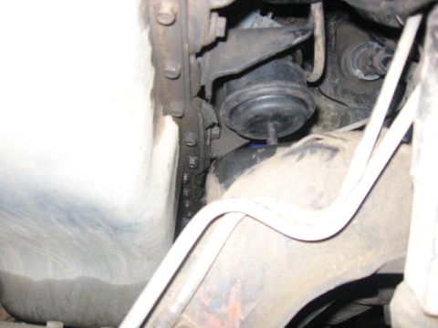 1989 Ford Bronco - Close-up view of an engine mount, likely from the underside of a vehicle.