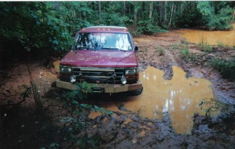 1995 Ford Bronco - This 1995 Ford Bronco navigates a challenging muddy trail in Barnwell ORV Park.