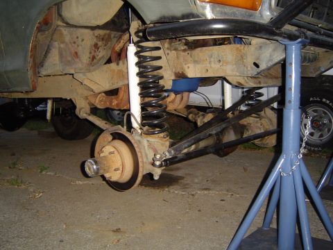 1978 Ford Bronco - The front suspension of a 1978 Ford Bronco is shown with modifications for a lift kit.