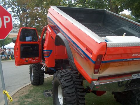 1978 Ford Bronco - This heavily modified pickup truck features a lifted suspension and custom paintwork.