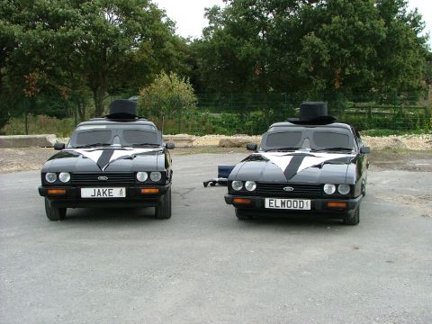 2001 Ford Fiesta - Two Ford Capris are dressed as the Blues Brothers, complete with top hats and tie decals.