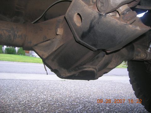 1996 Ford Bronco - Close-up of a vehicle's rear differential housing, showing mechanical components.