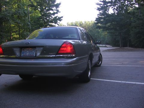 2000 Ford Crown Victoria - This 2000 Ford Crown Victoria is seen from the rear in a parking lot.