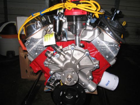 1989 Ford Bronco - Close-up of a V8 engine assembly Edelbrock Performer components and a new oil filter.