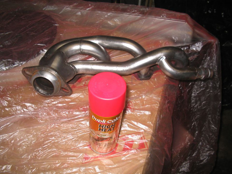Exhaust manifold with a can of Dupli-Color High Heat paint