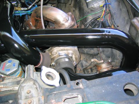 1981 Ford LTD - Cold side piping on the drivers side. The two pipes on the right head down to the filter box in the drivers side fender.
