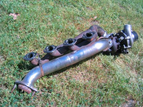 1981 Ford LTD - Almost done on the drivers side. I haven't made the strap to support the back of the down pipe yet and it's not painted.