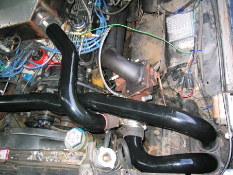 1981 Ford LTD - See the cold side pipes disappear into the fender? I built a custom box to hold a 8"x16" panel filter. Later I moved to pod filte…