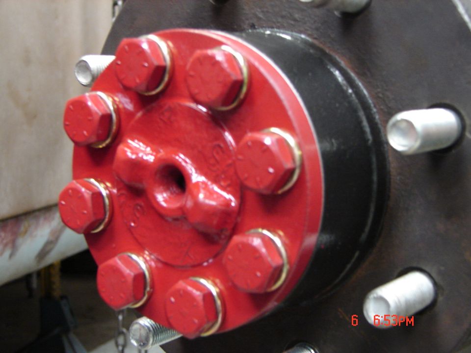 Red axle hub with eight bolts and gold washers