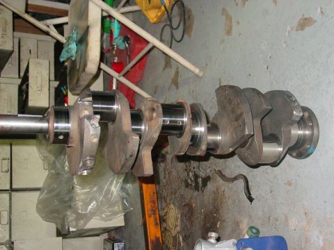 1979 Ford Bronco - A crankshaft, a critical component of an internal combustion engine, is shown here.