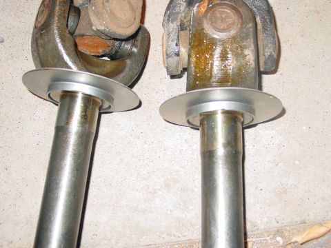 1979 Ford Bronco - Close-up of two driveshaft yokes, showing their connection points for u-joints.