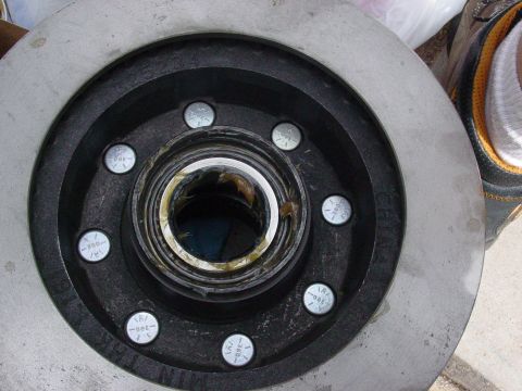 1979 Ford Bronco - Close-up of a wheel hub and brake rotor assembly, likely for a truck or SUV.