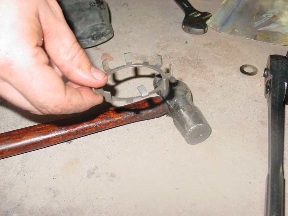 Part being held over a hammer