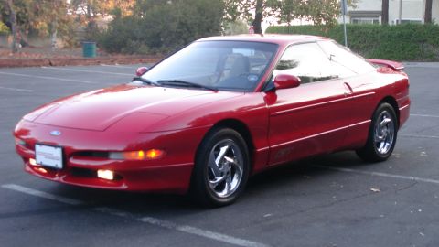 1996 Ford Probe - This red 1996 Ford Probe is parked in an outdoor lot.
