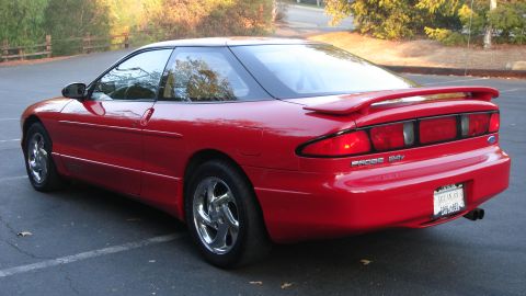 1996 Ford Probe - The rear of a red 1996 Ford Probe GT is shown, a spoiler and a license plate.
