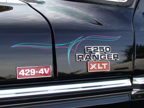 1979 Ford F-250 - Close-up of the fender badges on a 1979 Ford F-250 Ranger XLT, indicating the 429-4V engine.